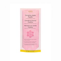 A 16 ounce retail pack of GiGi Cinnamon Apple Paraffin Wax  labelled with product name in 3 languages