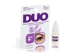 Expansive side view Ardell DUO Individual Lash Adhesive Clear retail box side by side with lash adhesive bottle