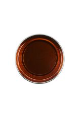 Top view of an open can of GiGi Facial Honee Soft Wax showcasing its deep brown translucent colored wax contents