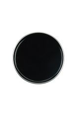 Top view of an open can of GiGi Dark Honee showing its almost black, dark brown color