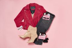 A woman blazer, pants, and boots with 3-pieces Hollywood fashion secrets item on top
