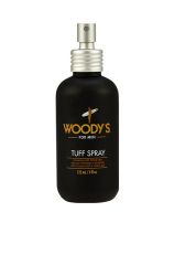 Closeup of woody's  tuff spray bottle with printed product label with some text in three different languages