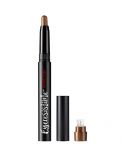 Uncapped Ardell Eyeresistible Shadow Stick Rude Touching Copper standing upright alongside its cap & sharpener